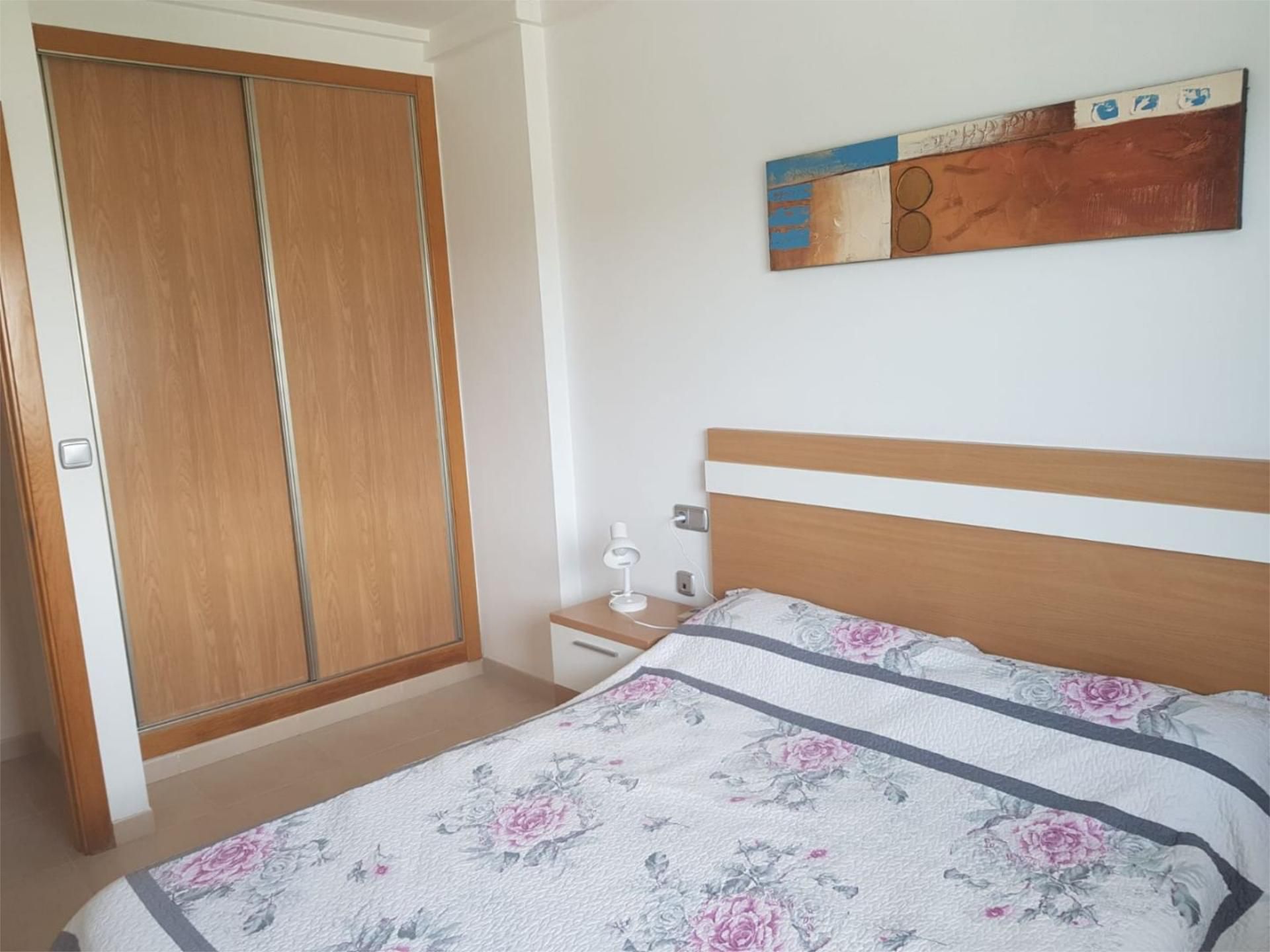 Pis de lloguer a Glorieta del Reino Unido, 6, Palmeral Dormitori de Pis de lloguer en Alicante / Alacant amb Aire condicionat, Calefacció i Piscina