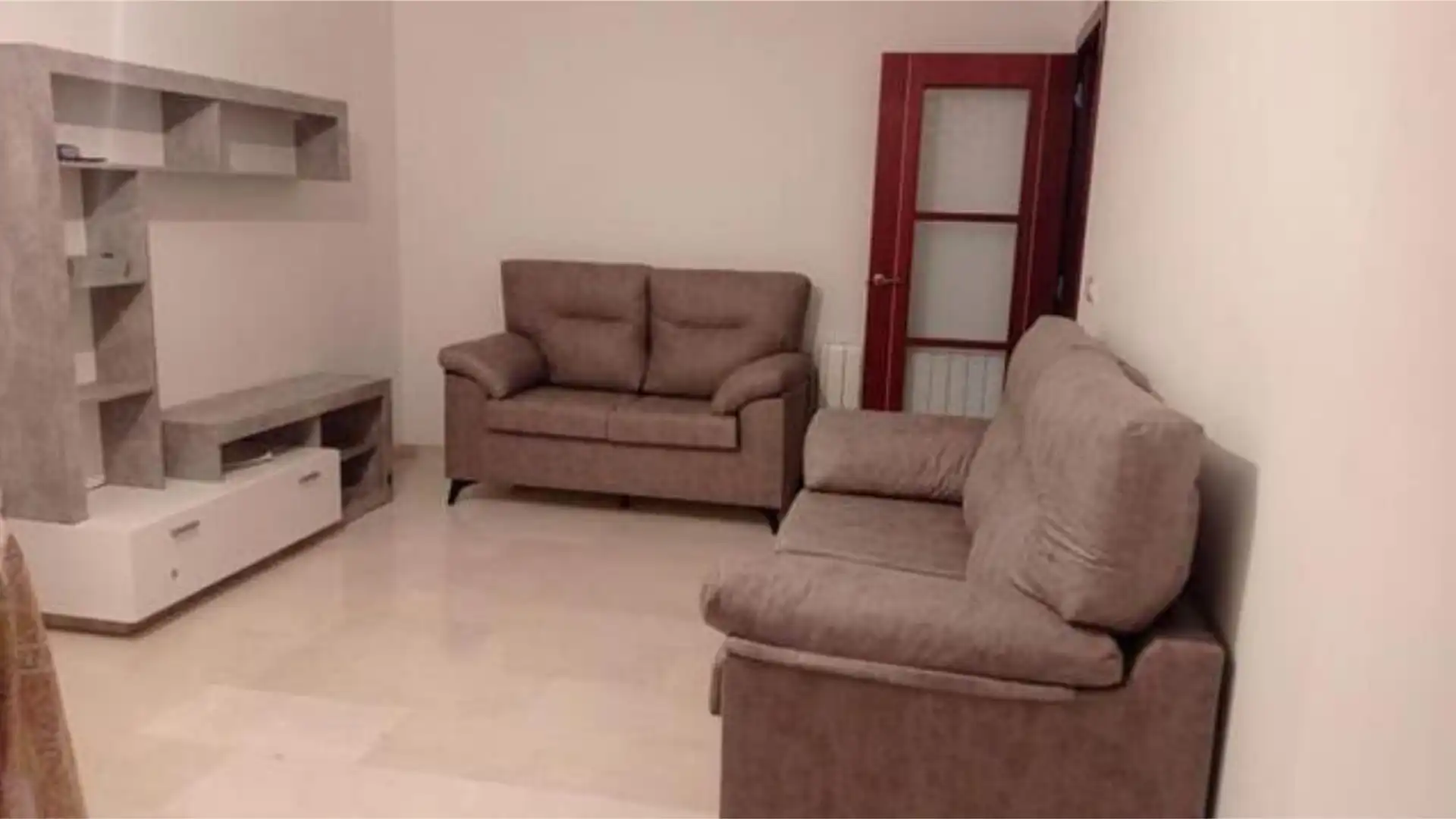 Piso en venta en Torredonjimeno Sala de estar de Piso en venta en Torredonjimeno con Terraza, Piscina y Amueblado