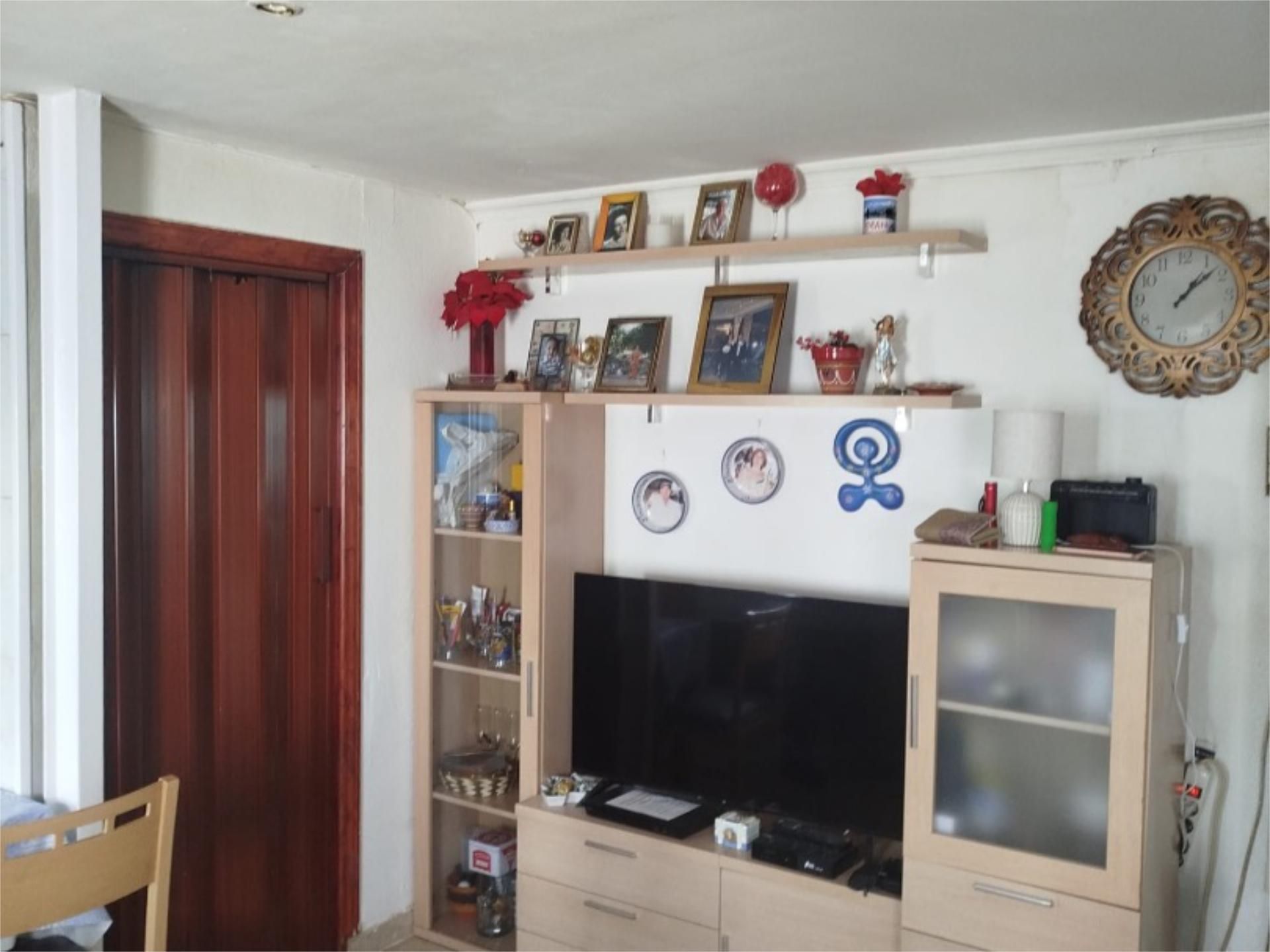 Sala d'estar de Casa adosada en venda en  Madrid Capital amb Aire condicionat