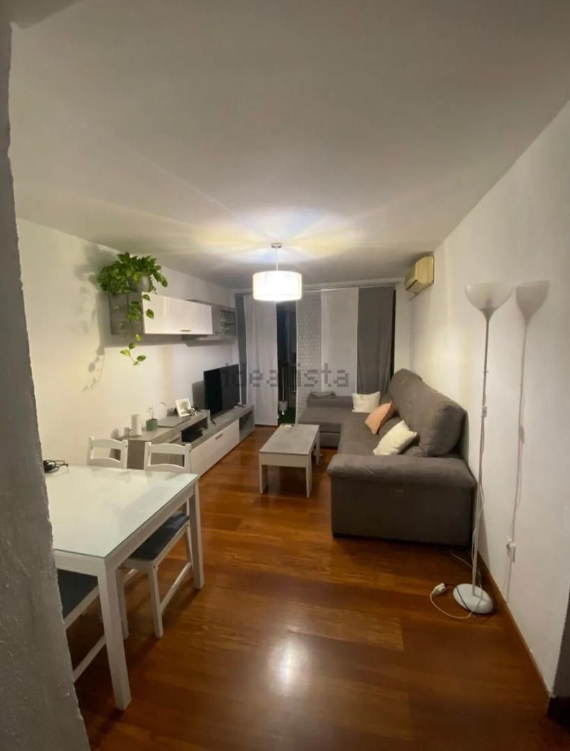 Living room of Flat for sale in  Sevilla Capital  with Air Conditioner, Parquet flooring and Terrace