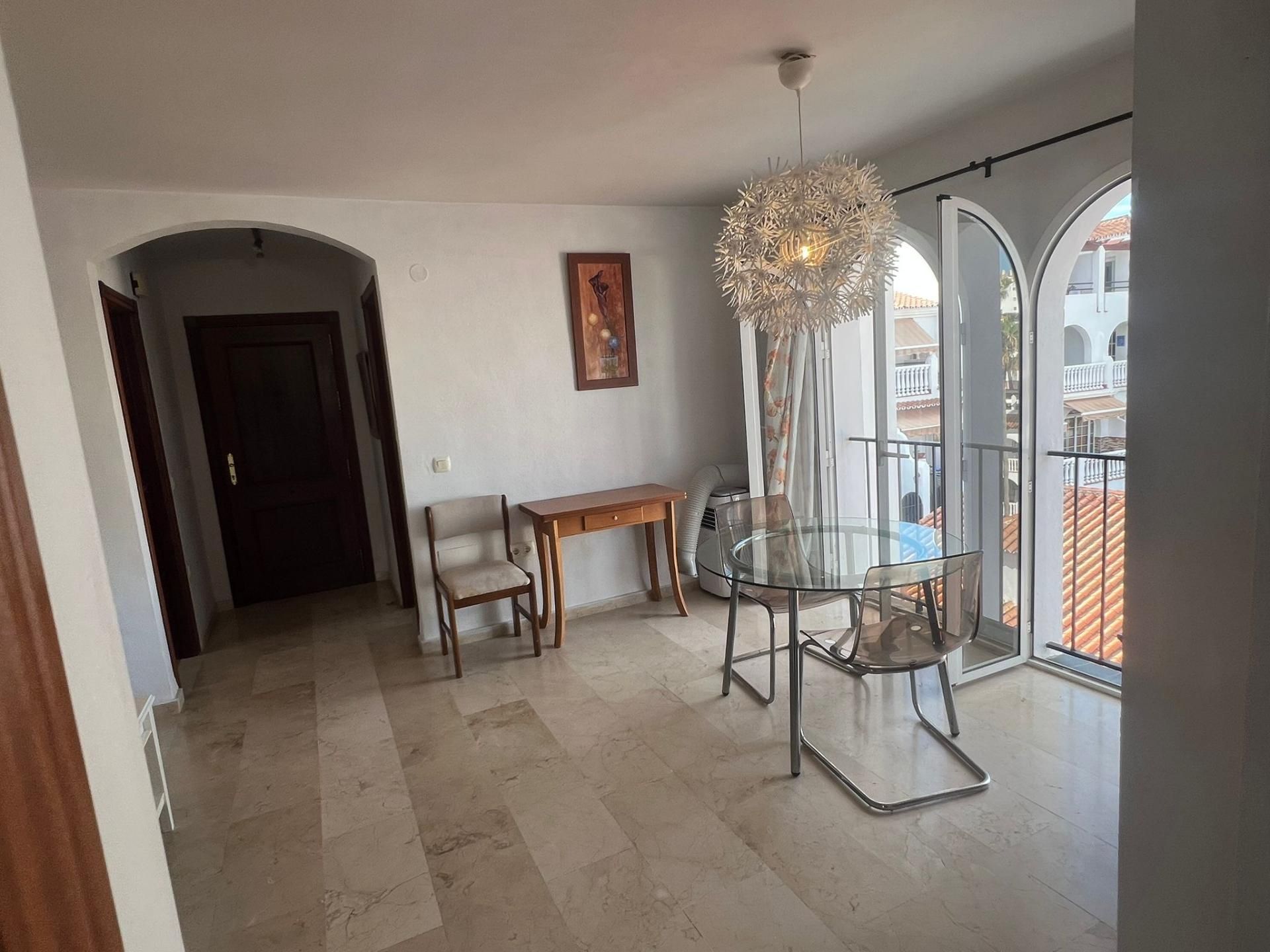 Comedor de Piso de alquiler en Mijas con Jardín privado, Piscina y Amueblado
