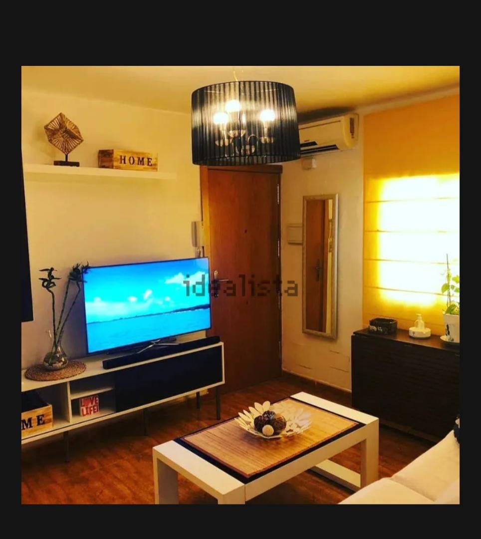 Sala d'estar de Apartament per a compartir en  Almería Capital amb Aire condicionat, Calefacció i Moblat