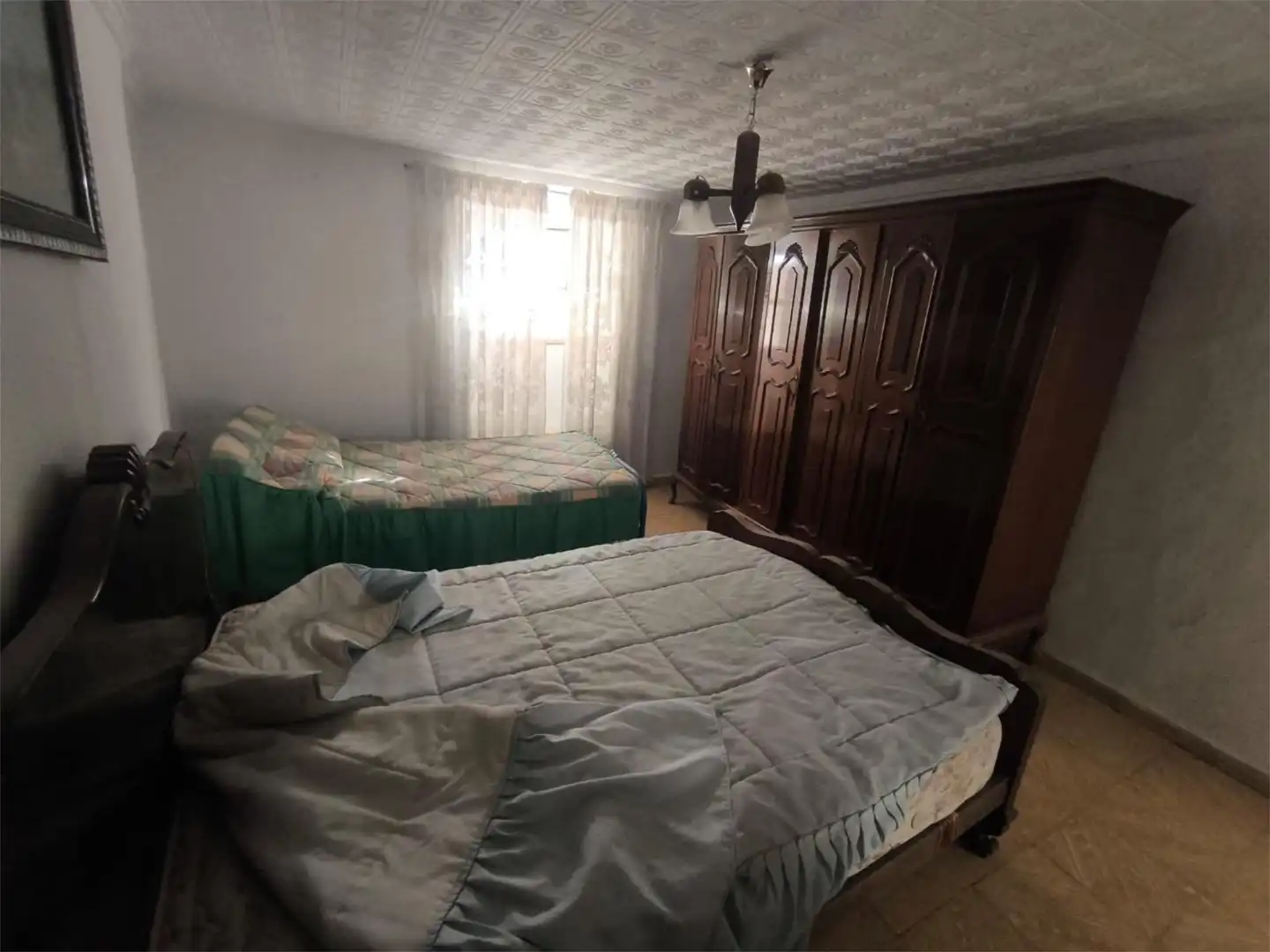Casa adosada en venda a A-326, 19, Huéscar Dormitori de Casa adosada en venda en Huéscar amb Aire condicionat, Jardí privat i Terrassa