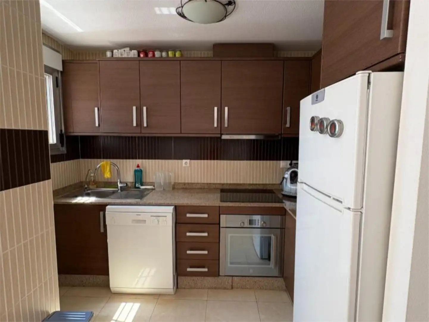 Attic for sale in Calle Pleamar, 11, Punta Prima Kitchen of Attic for sale in Torrevieja with Air Conditioner, Terrace and Swimming Pool