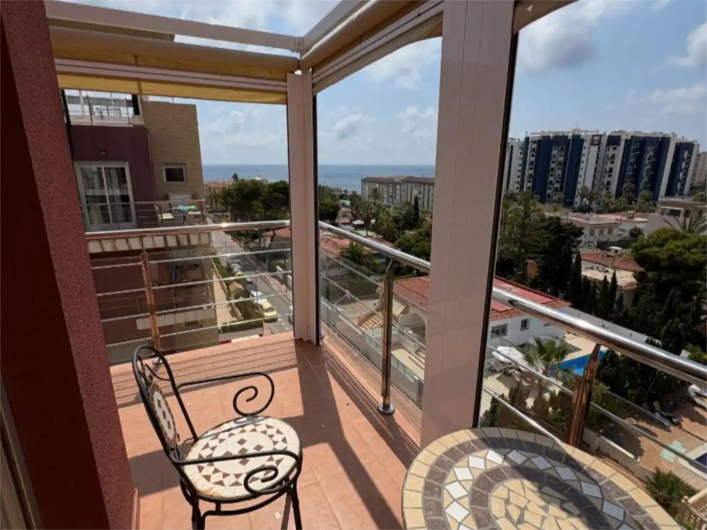 Attic for sale in Calle Pleamar, 11, Punta Prima Balcony of Attic for sale in Torrevieja with Air Conditioner, Terrace and Swimming Pool