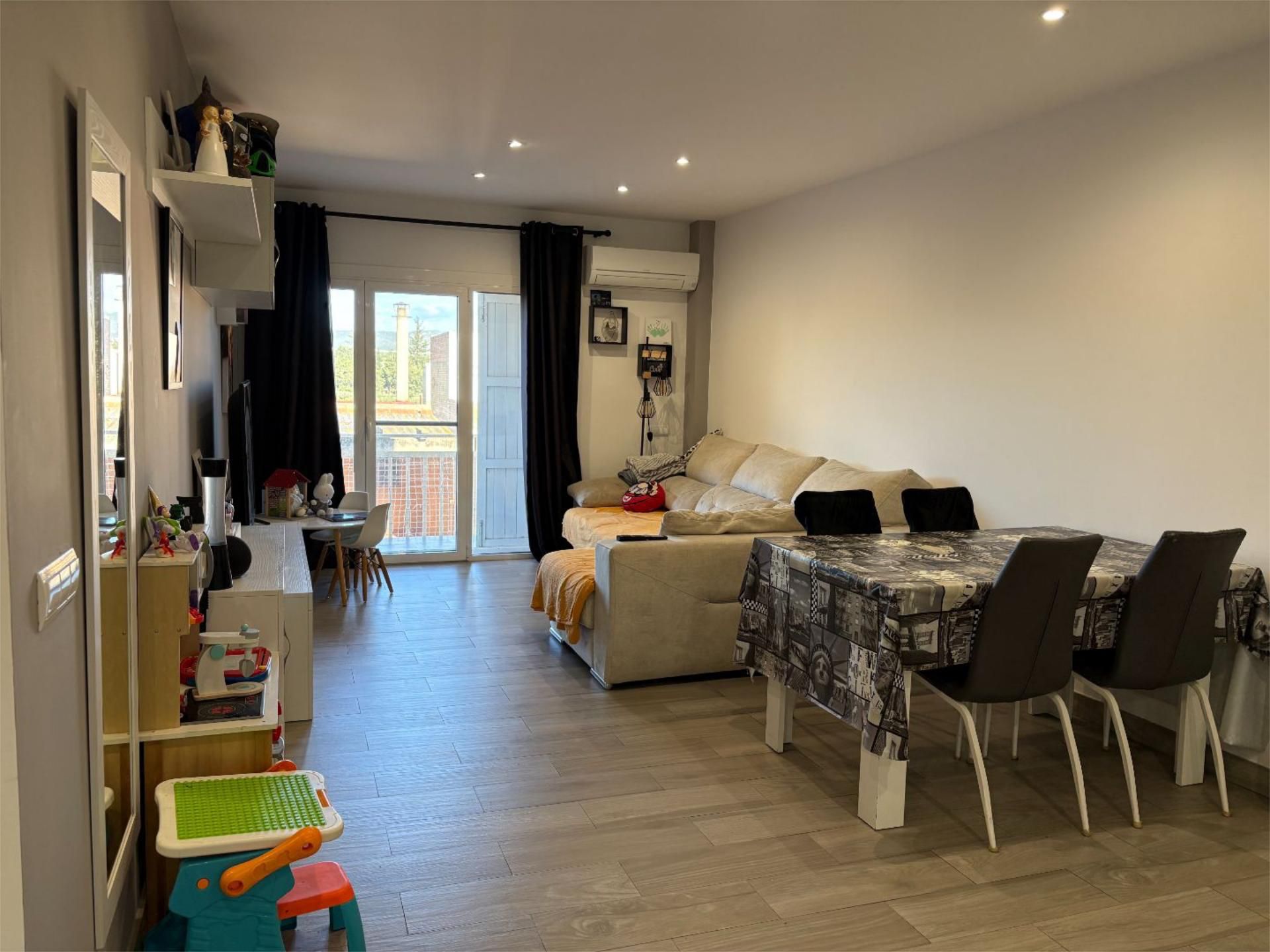 Living room of Flat for sale in L'Aldea  with Air Conditioner and Balcony