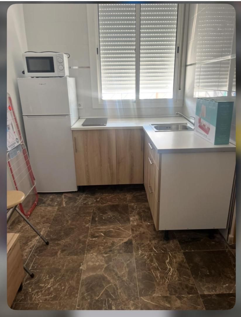 Cuina de Dúplex de lloguer en Dos Hermanas amb Aire condicionat, Terrassa i Moblat