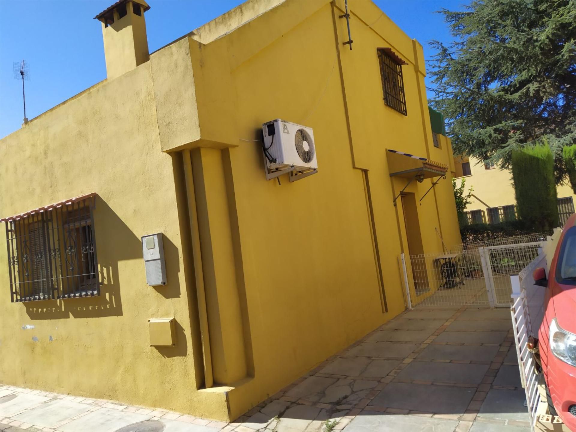 Exterior view of Single-family semi-detached for sale in Ogíjares  with Air Conditioner, Terrace and Swimming Pool