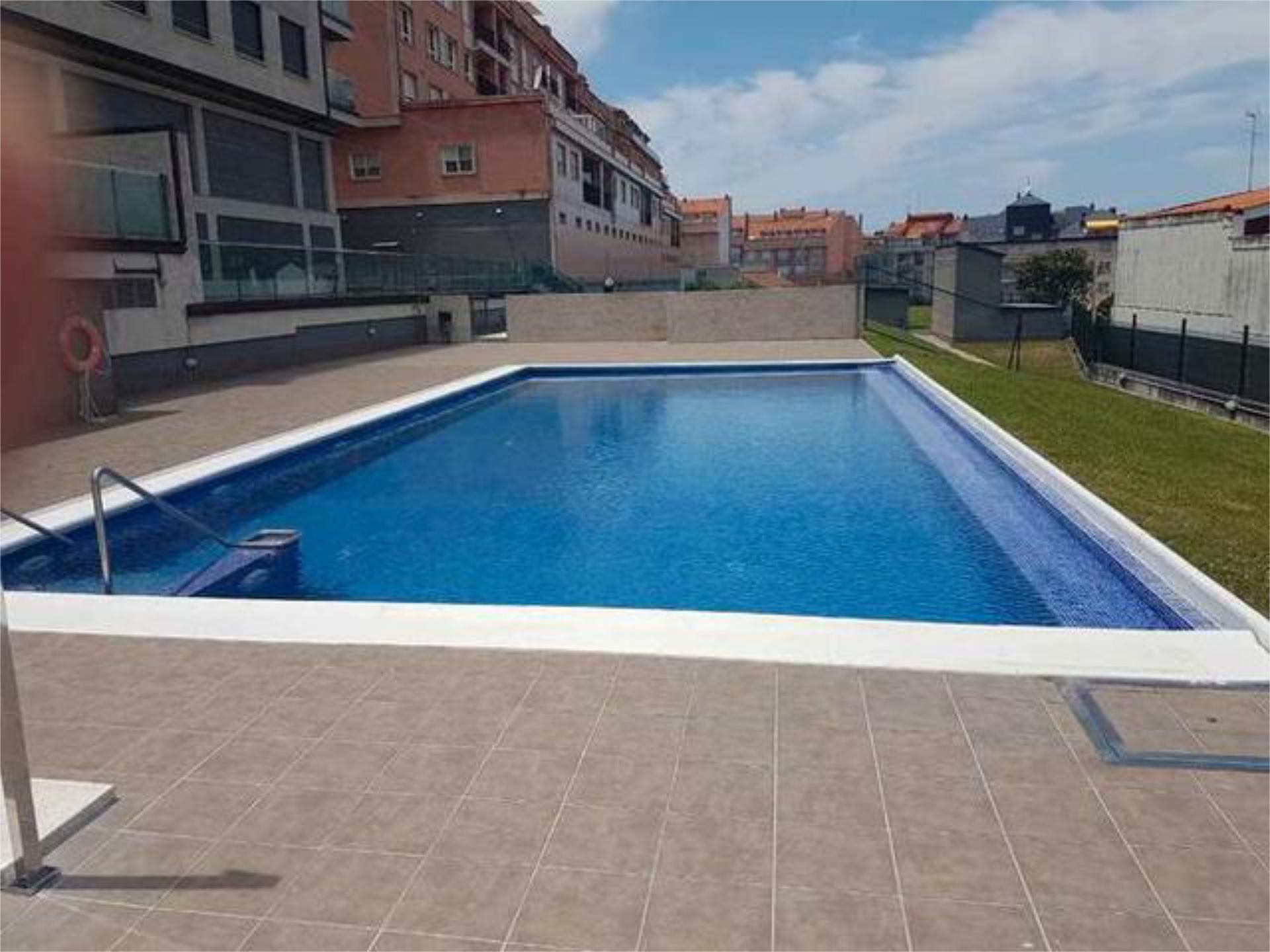 Piscina de Apartament en venda en Sanxenxo amb Calefacció, Jardí privat i Traster