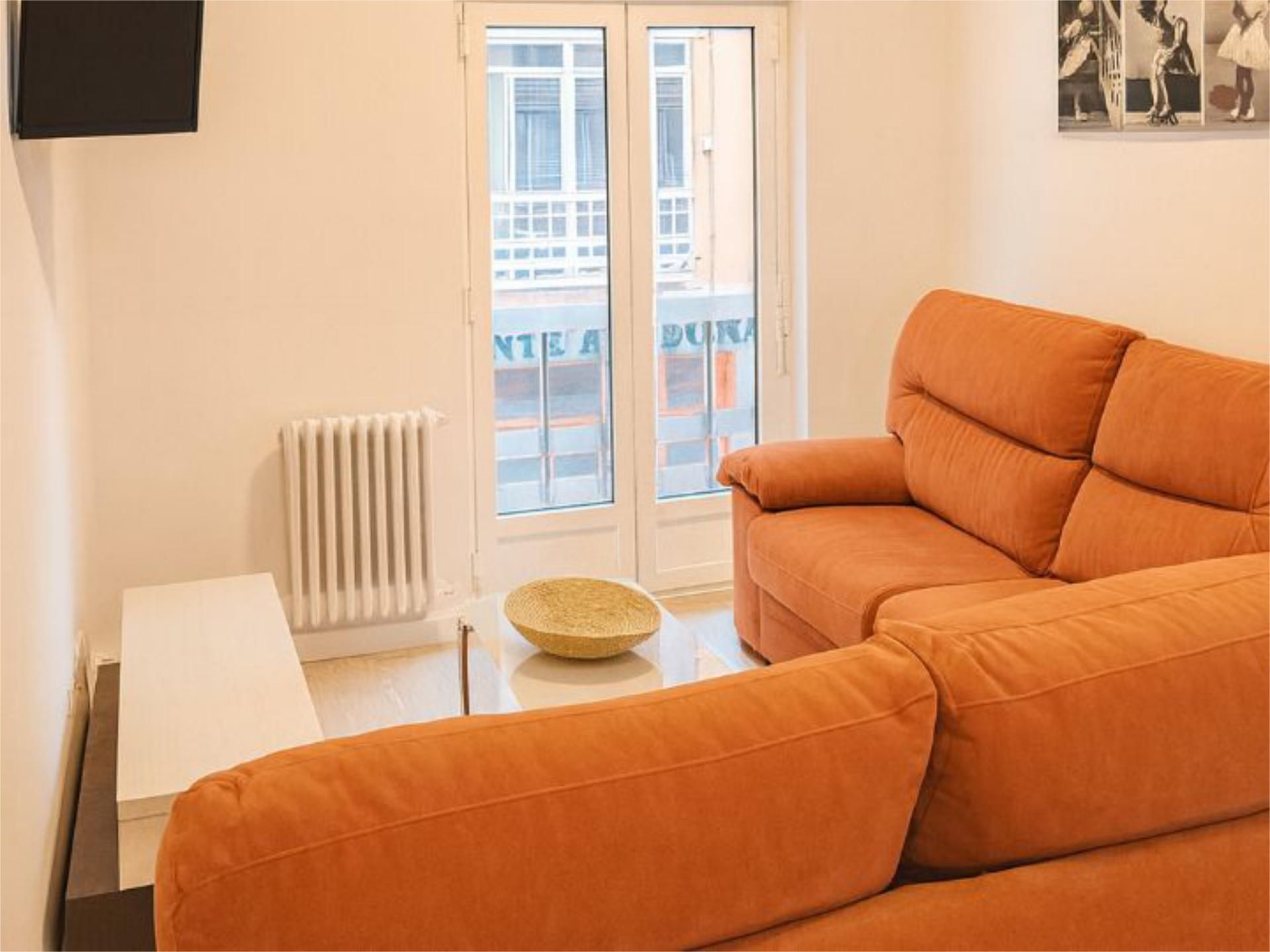 Piso de alquiler en Calle San Vicente Mártir, 5, San Claudio - La Chantría Sala de estar de Piso de alquiler en León Capital con Terraza y Balcón