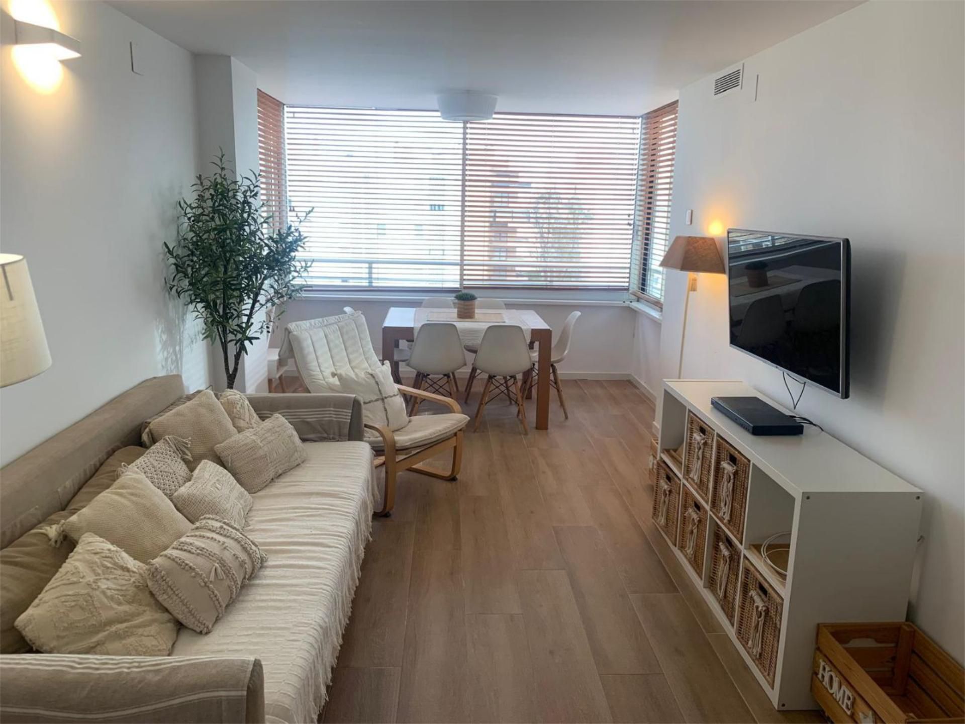 Sala d'estar de Apartament de lloguer en Sueca amb Calefacció, Jardí privat i Terrassa