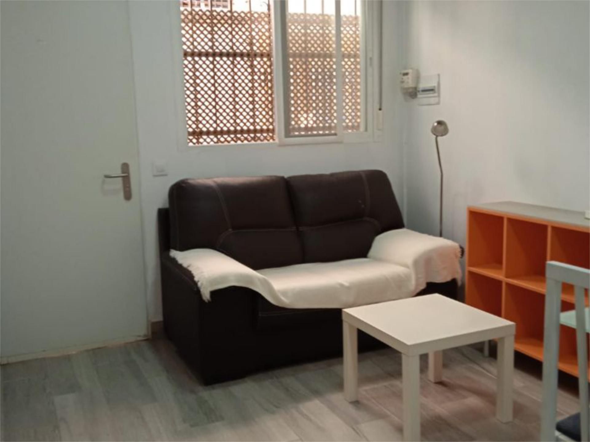 Sala de estar de Piso de alquiler en  Sevilla Capital con Aire acondicionado, Calefacción y Amueblado