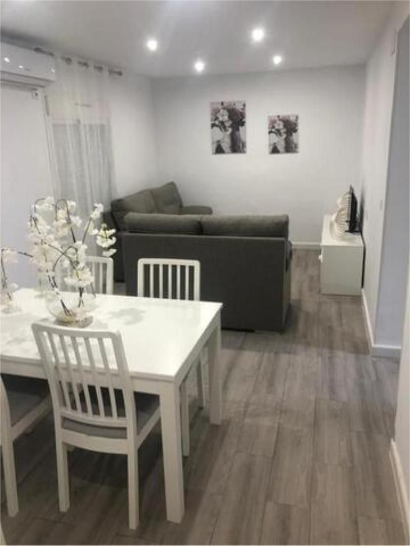 Sala d'estar de Pis de lloguer en Mérida amb Moblat