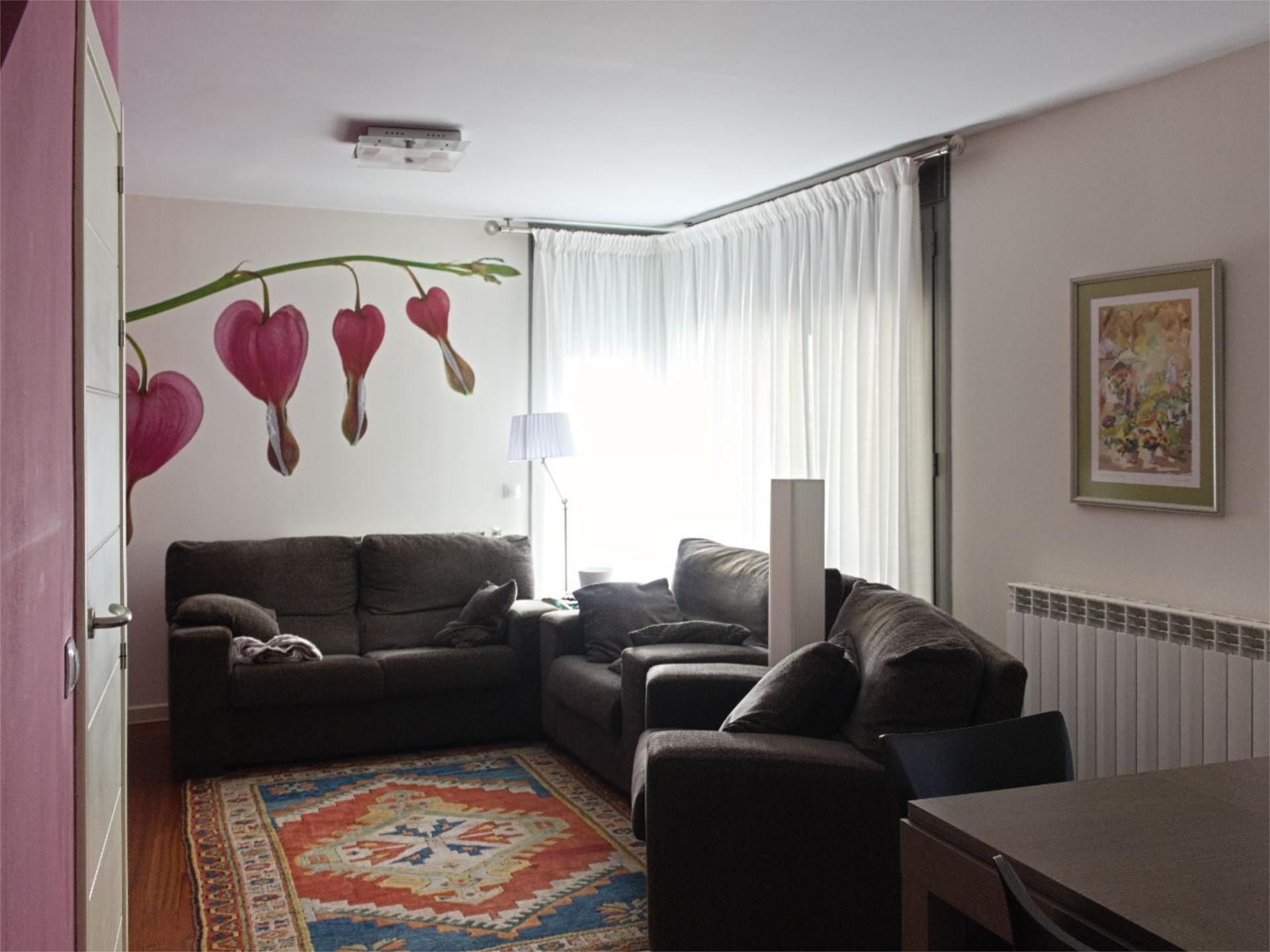 Casa adosada en venda a Calle Peña Telera, 2, Sabiñánigo Sala d'estar de Casa adosada en venda en Sabiñánigo amb Terrassa i Piscina