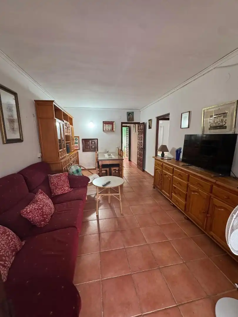 Casa adosada en venda a Carrer Mar Egeu, 2d, El Palmar - Los Molinos Sala d'estar de Casa adosada en venda en Dénia amb Aire condicionat i Terrassa