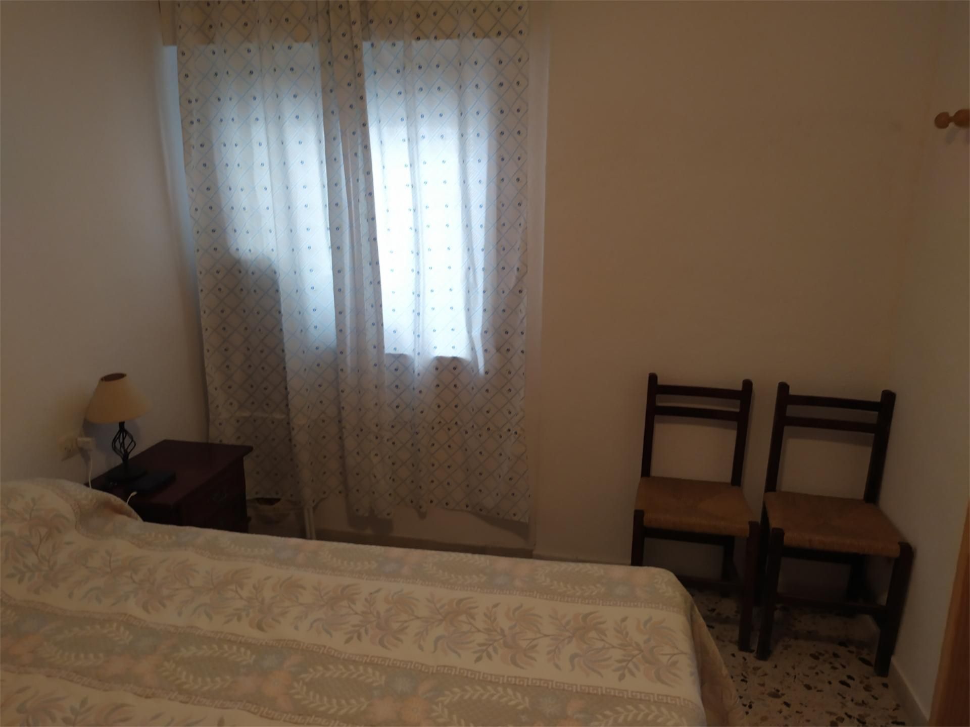 Pis de lloguer a Calle Cisne, 2, Punta Umbría Dormitori de Pis de lloguer en Punta Umbría amb Moblat, Forn i Rentadora