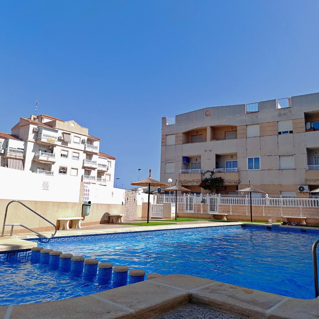 Swimming pool of Apartment to rent in Torrevieja  with Air Conditioner, Heating and Terrace