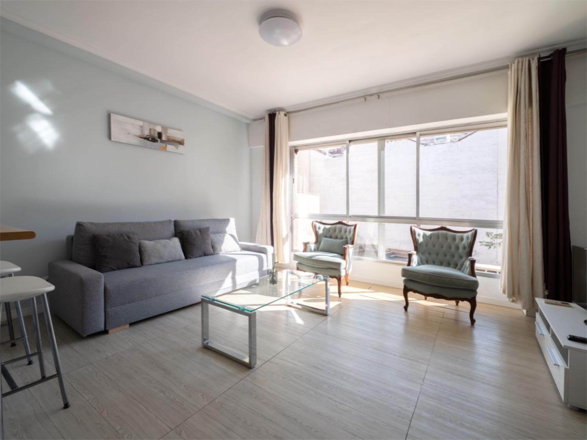 Living room of Flat to rent in  Madrid Capital  with Air Conditioner, Heating and Private garden