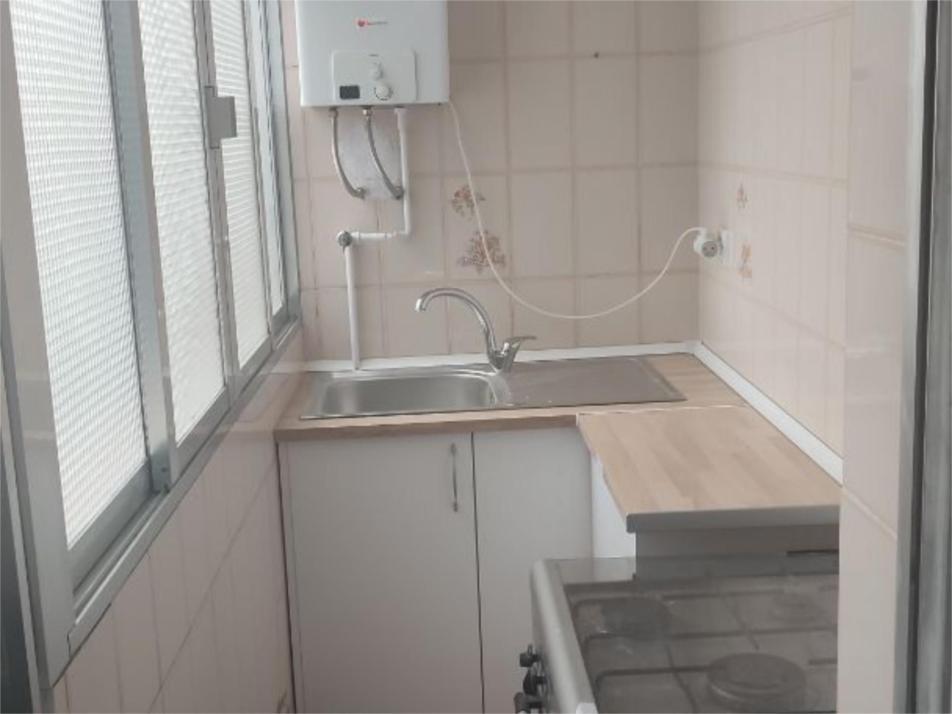 Kitchen of Flat for sale in  Madrid Capital  with Air Conditioner, Heating and Private garden