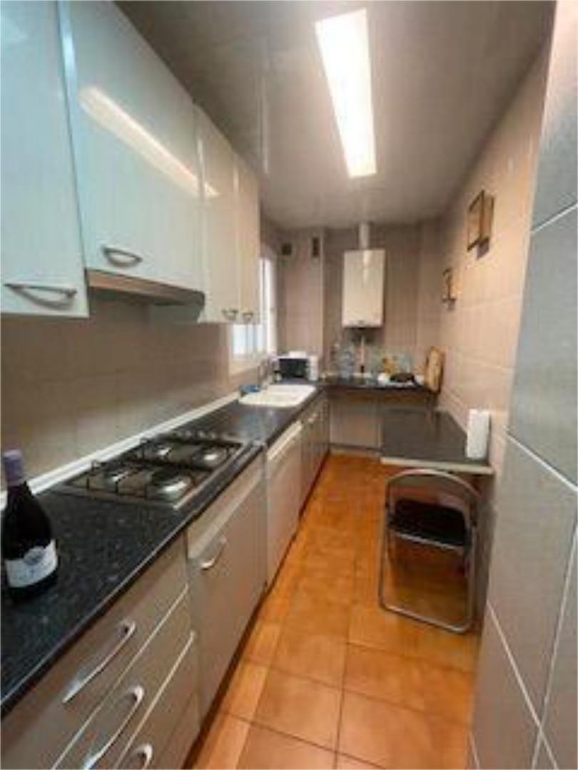 Pis de lloguer a El Parc i la Llacuna del Poblenou Cuina de Pis de lloguer en Barcelona Capital amb Calefacció i Moblat