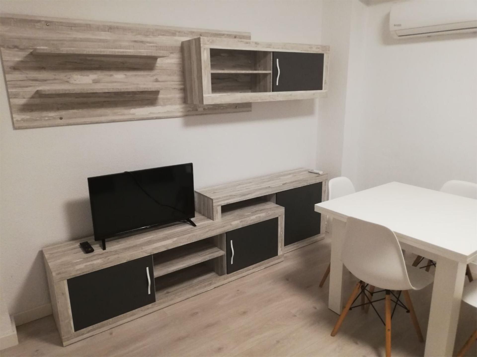 Living room of Flat to rent in Alzira  with Air Conditioner, Parquet flooring and Furnished