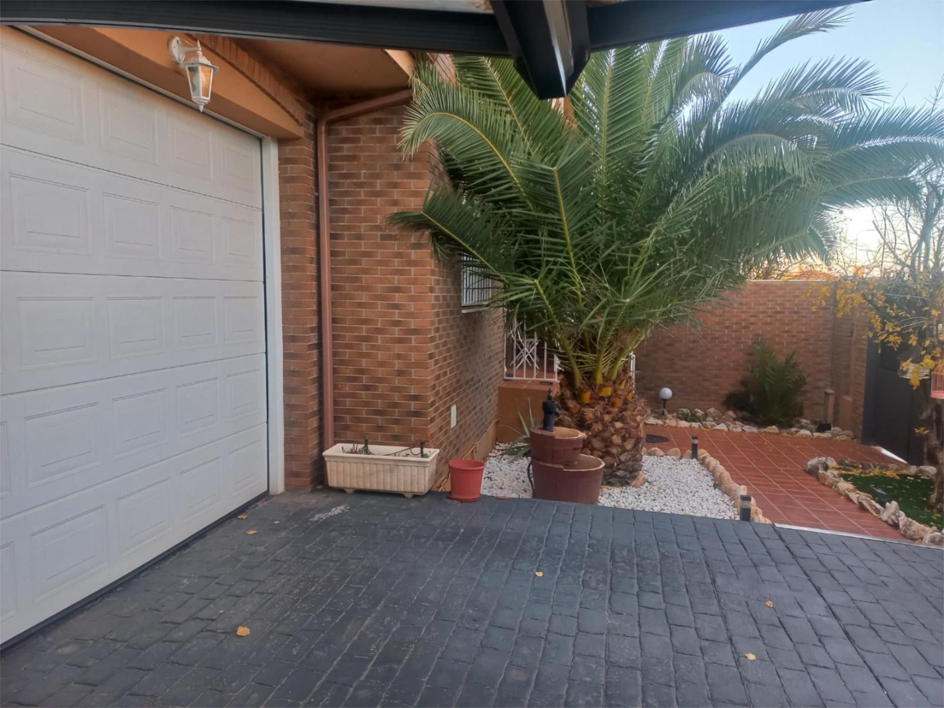 Exterior view of House or chalet for sale in Torres de la Alameda  with Air Conditioner, Private garden and Parquet flooring