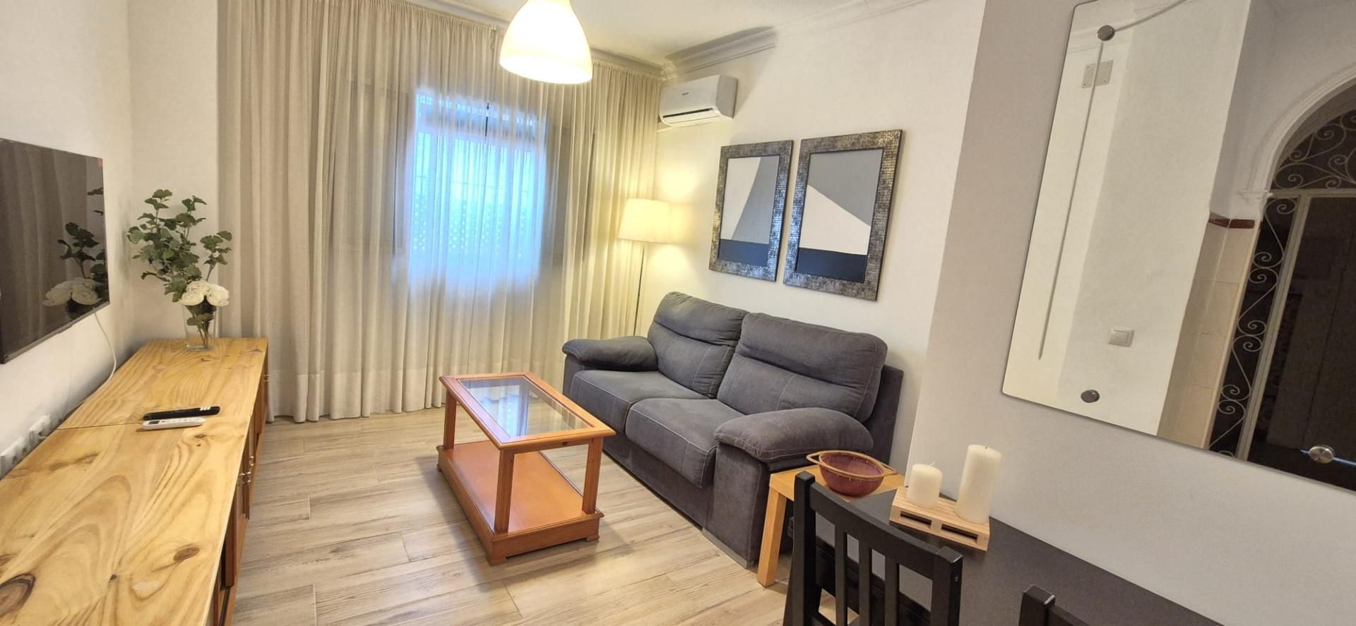 Apartament de lloguer a Calle Miguel Hernández, 36, Bollullos de la Mitación Sala d'estar de Apartament de lloguer en Bollullos de la Mitación amb Aire condicionat, Calefacció i Moblat