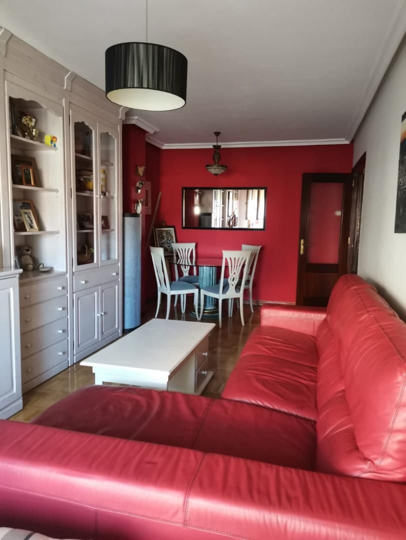 Living room of Flat for sale in Gijón   with Heating, Parquet flooring and Furnished