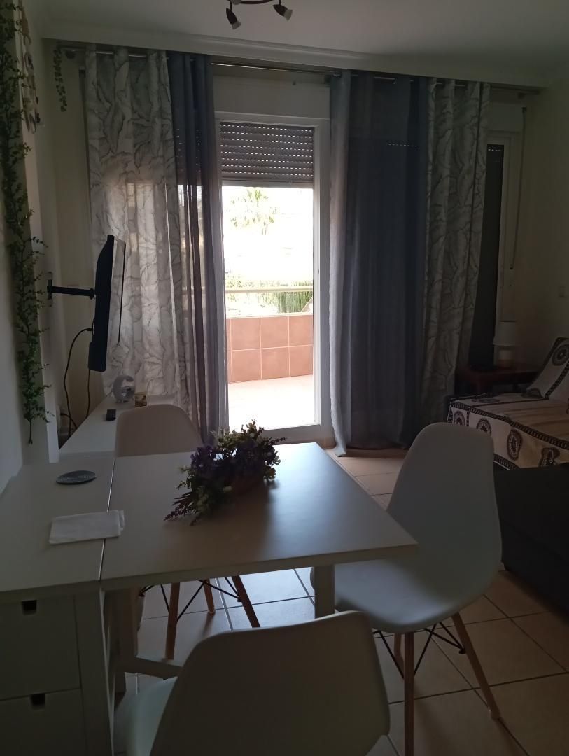 Dormitori de Apartament de lloguer en Oliva amb Aire condicionat, Calefacció i Jardí privat