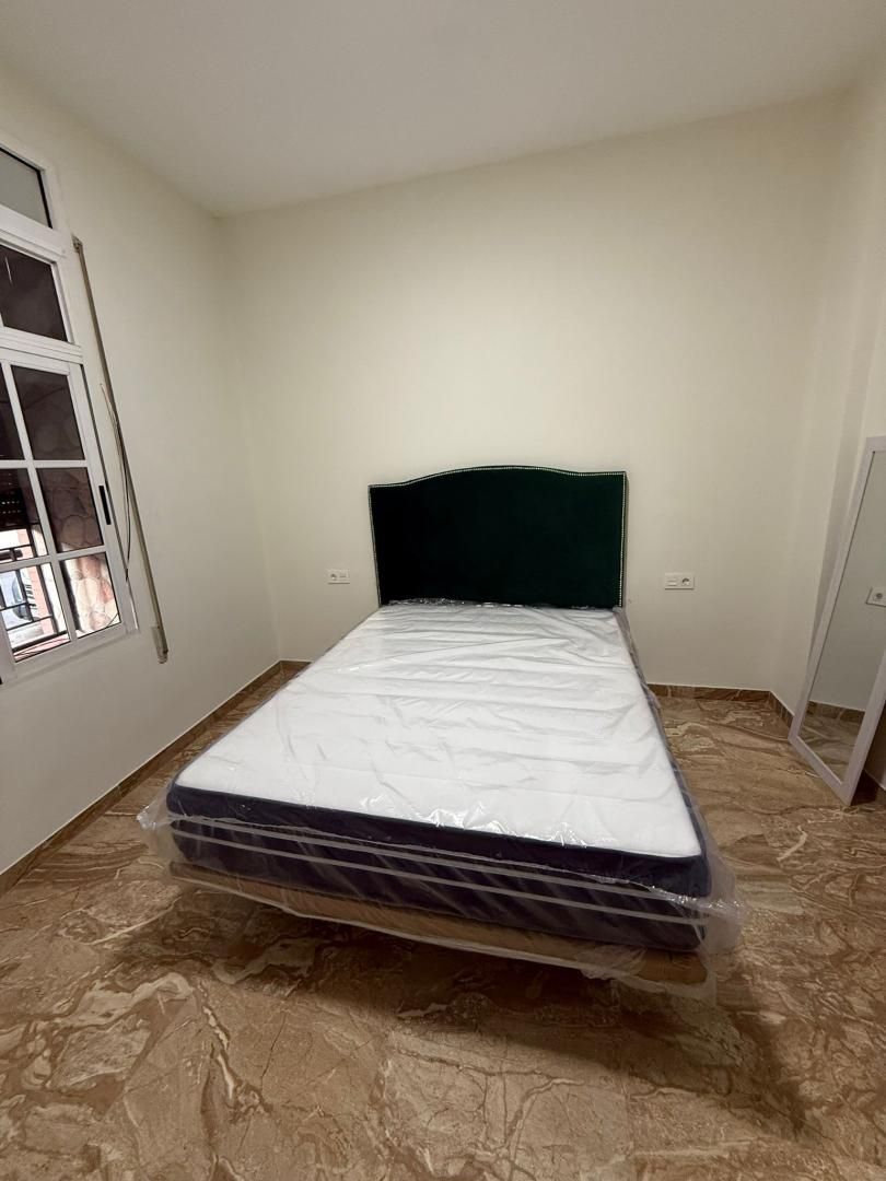 Bedroom of Flat to share in  Melilla Capital  with Air Conditioner and Furnished