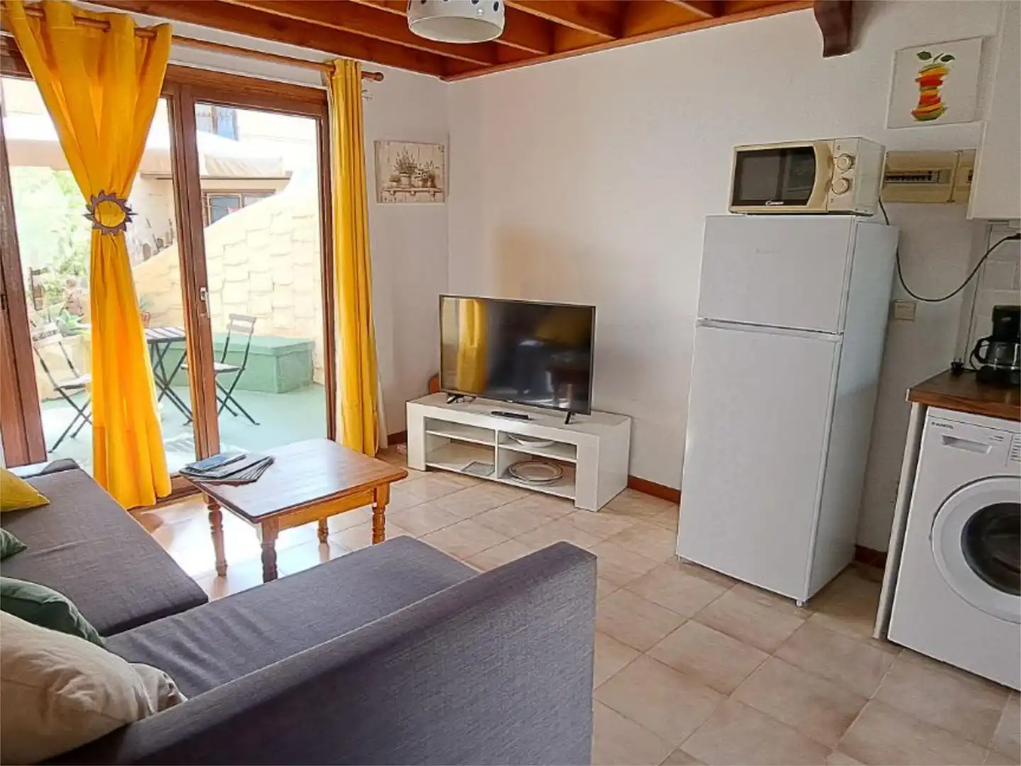 Sala d'estar de Casa adosada en venda en La Oliva amb Terrassa, Piscina i Moblat