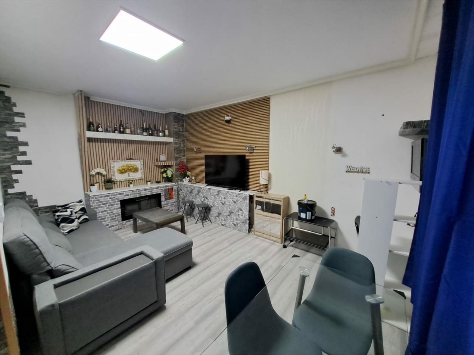 Planta baja en venta en Calle Francisco de Goya, 6, Grañén Sala de estar de Planta baja en venta en Grañén con Aire acondicionado, Calefacción y Parquet