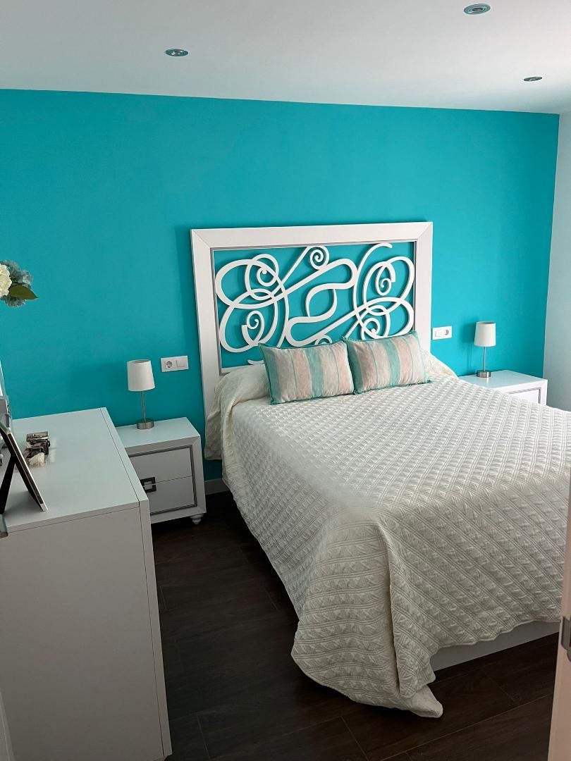 Casa adosada en venda a Calle Reyes Católicos, 63, La Carolina Dormitori de Casa adosada en venda en La Carolina amb Aire condicionat i Balcó