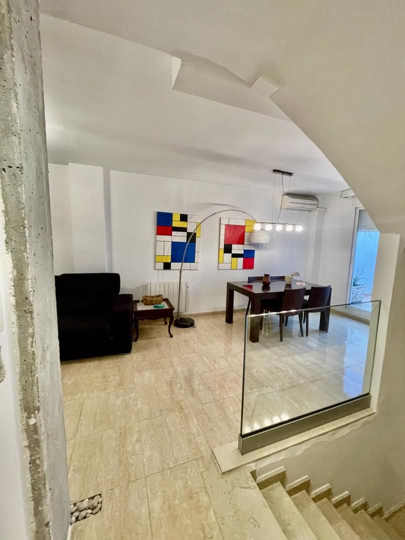 Casa adosada en venda a Carrer Sèquia de Mestalla, 2, Aldaia Menjador de Casa adosada en venda en Aldaia amb Terrassa i Balcó