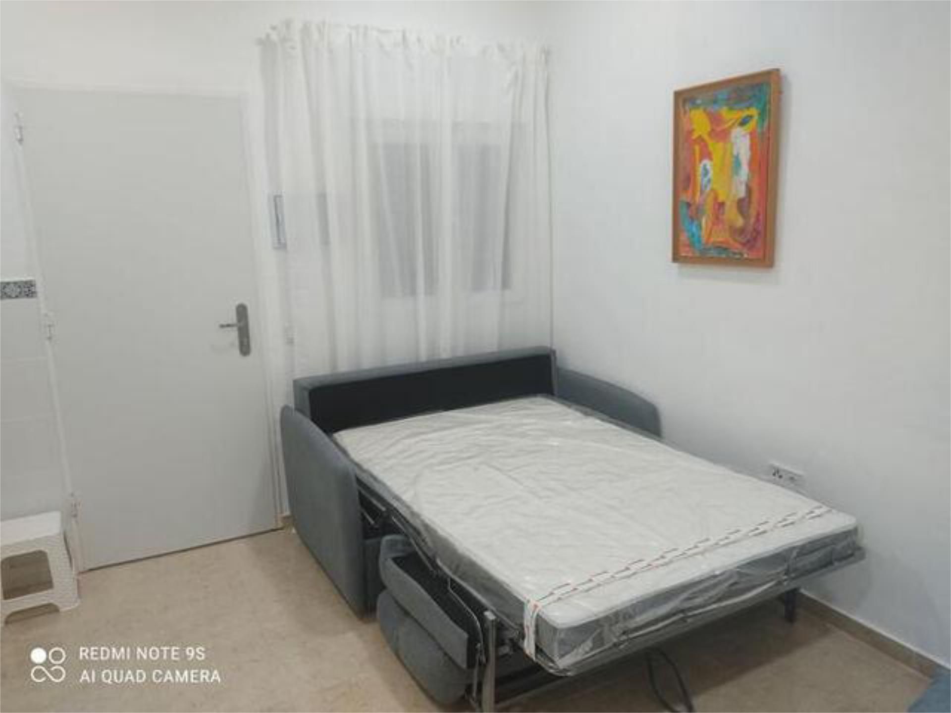 Dormitori de Apartament de lloguer en Bollullos de la Mitación