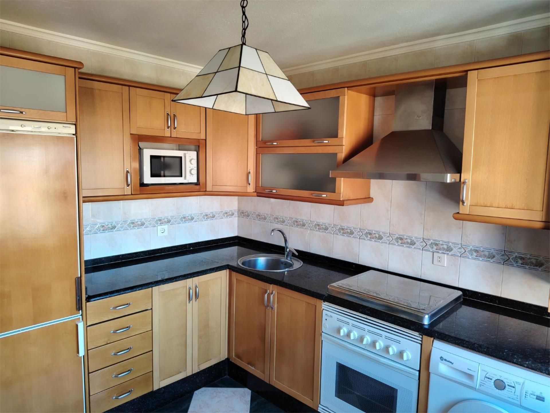 Kitchen of Flat for sale in Gijón   with Heating, Parquet flooring and Storage room