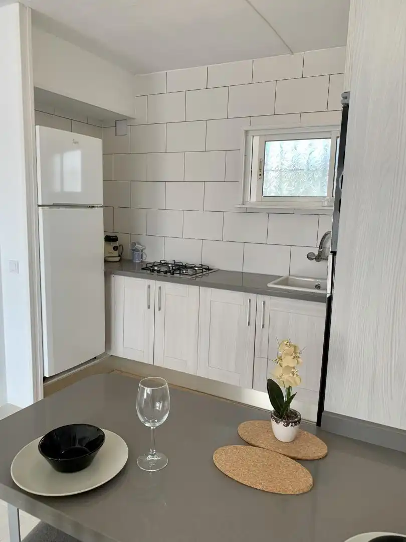 Wohnung zum Verkauf in Urbanización Punta Europa, 43b, Torreguadiaro - San Diego Küche von Wohnung zum Verkauf in Sotogrande mit Klimaanlage, Terrasse und Balkon