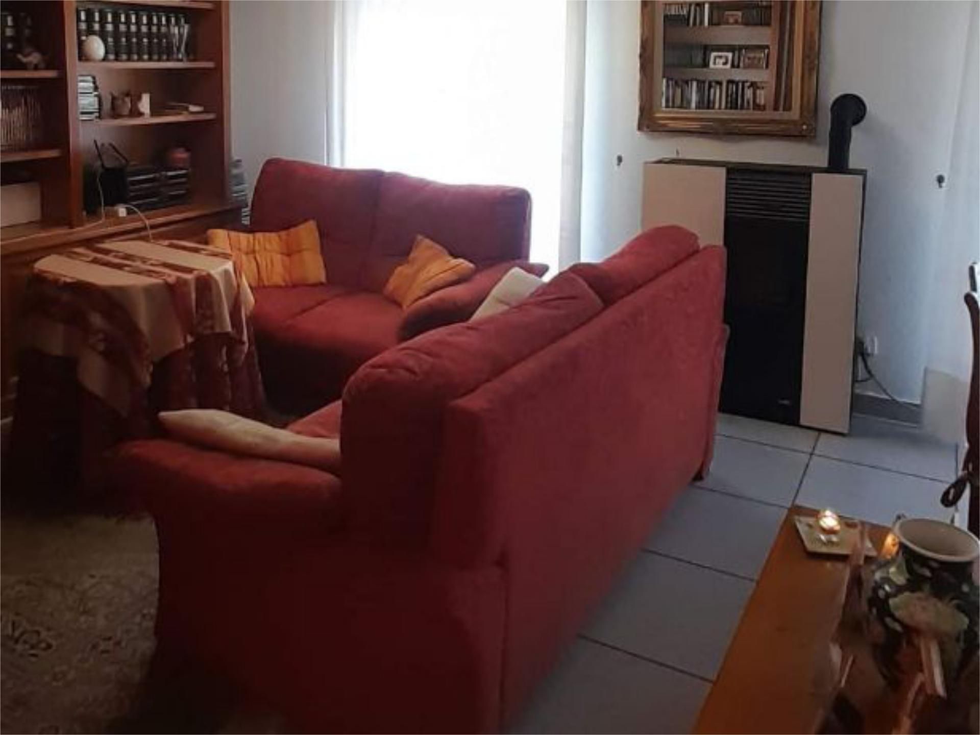 Sala d'estar de Casa adosada en venda en Novelda amb Aire condicionat, Terrassa i Balcó