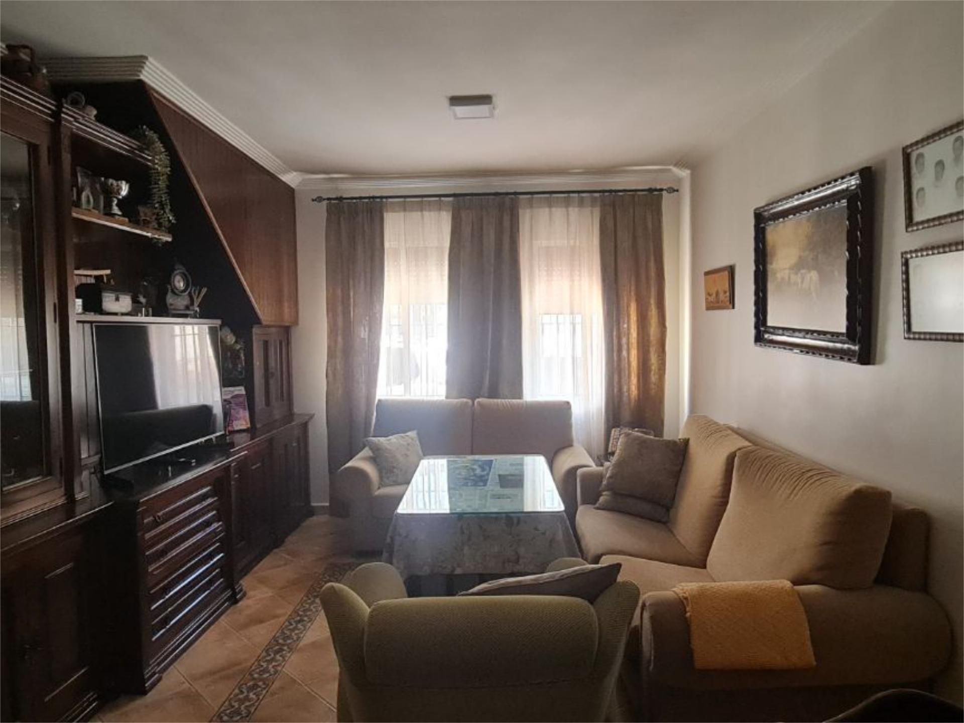 Sala d'estar de Casa adosada en venda en Los Palacios y Villafranca amb Aire condicionat, Terrassa i Balcó