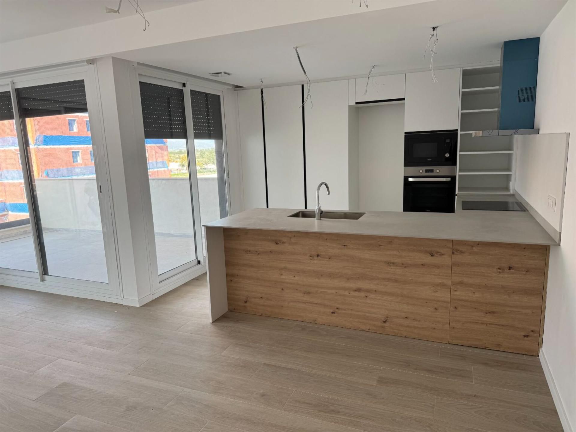 Kitchen of Flat for sale in Sagunto / Sagunt  with Air Conditioner, Terrace and Swimming Pool