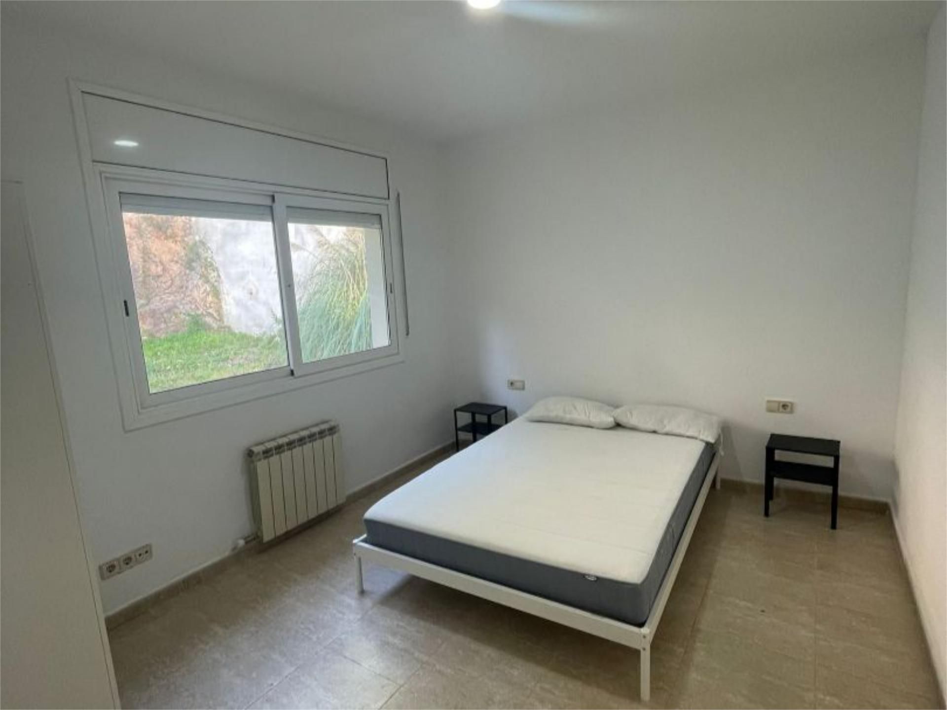 Casa adosada de lloguer a Carrer Macanet de la Selva, 25, Sils Dormitori de Casa adosada de lloguer en Sils amb Jardí privat, Parquet i Balcó