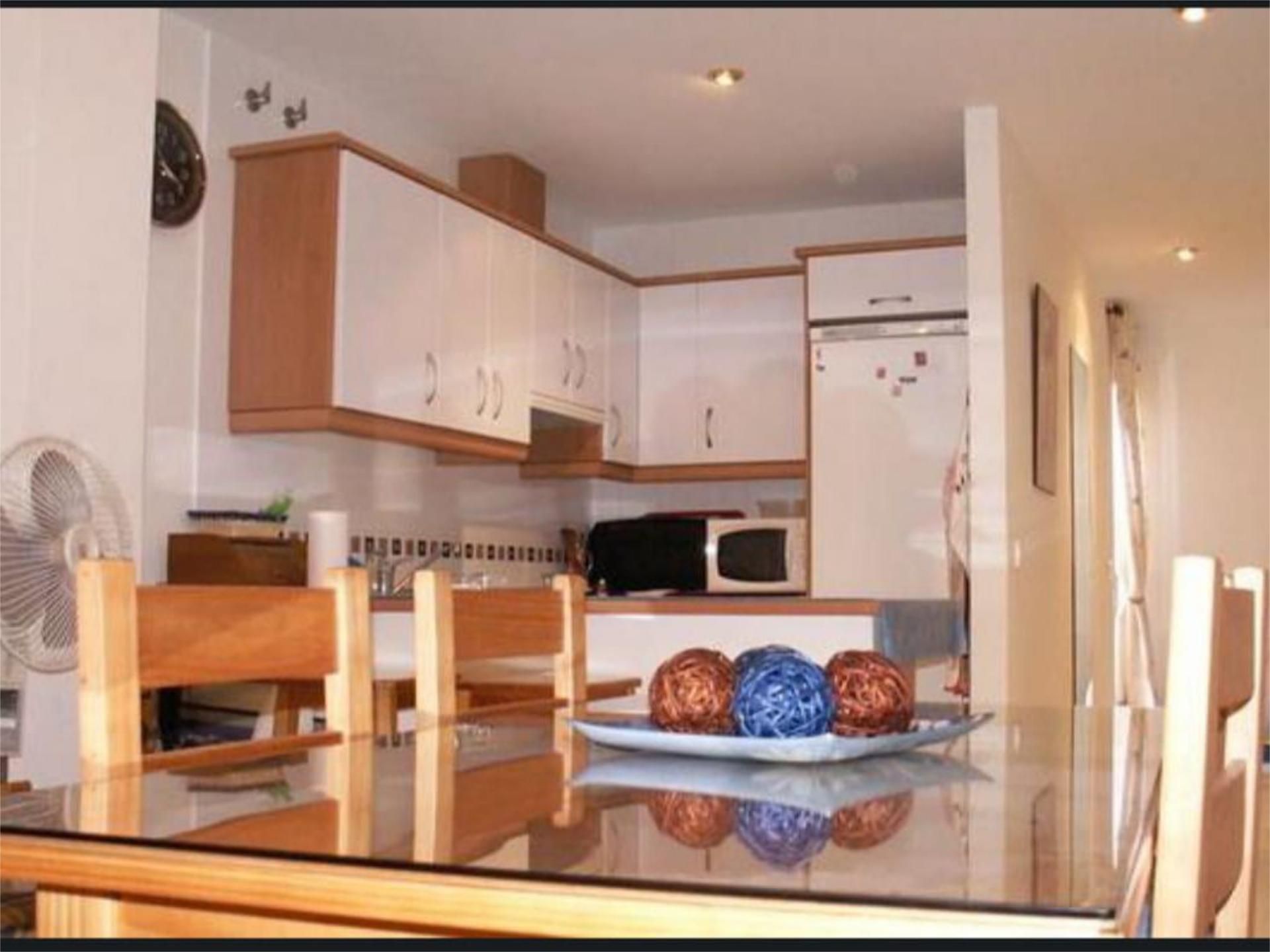 Cuina de Pis de lloguer en Nerja amb Aire condicionat, Calefacció i Jardí privat