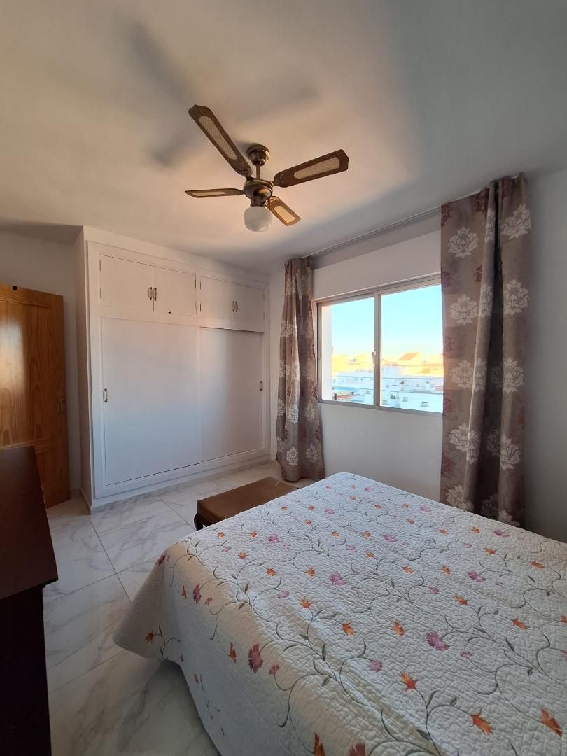 Dormitori de Apartament per a compartir en Estepona amb Moblat, Forn i Rentadora