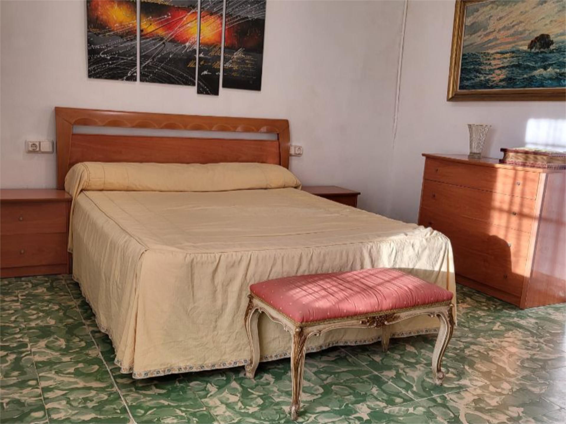 Casa adosada en venda a Carrer de Balaguer, 24, Bellvís Dormitori de Casa adosada en venda en Bellvís amb Aire condicionat, Jardí privat i Terrassa