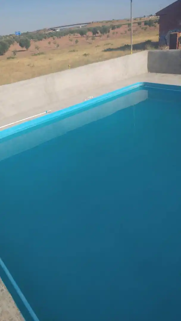 Piscina de Casa o chalet en venta en Alcázar de San Juan con Parking comunitario, Videoportero y Piscina comunitaria
