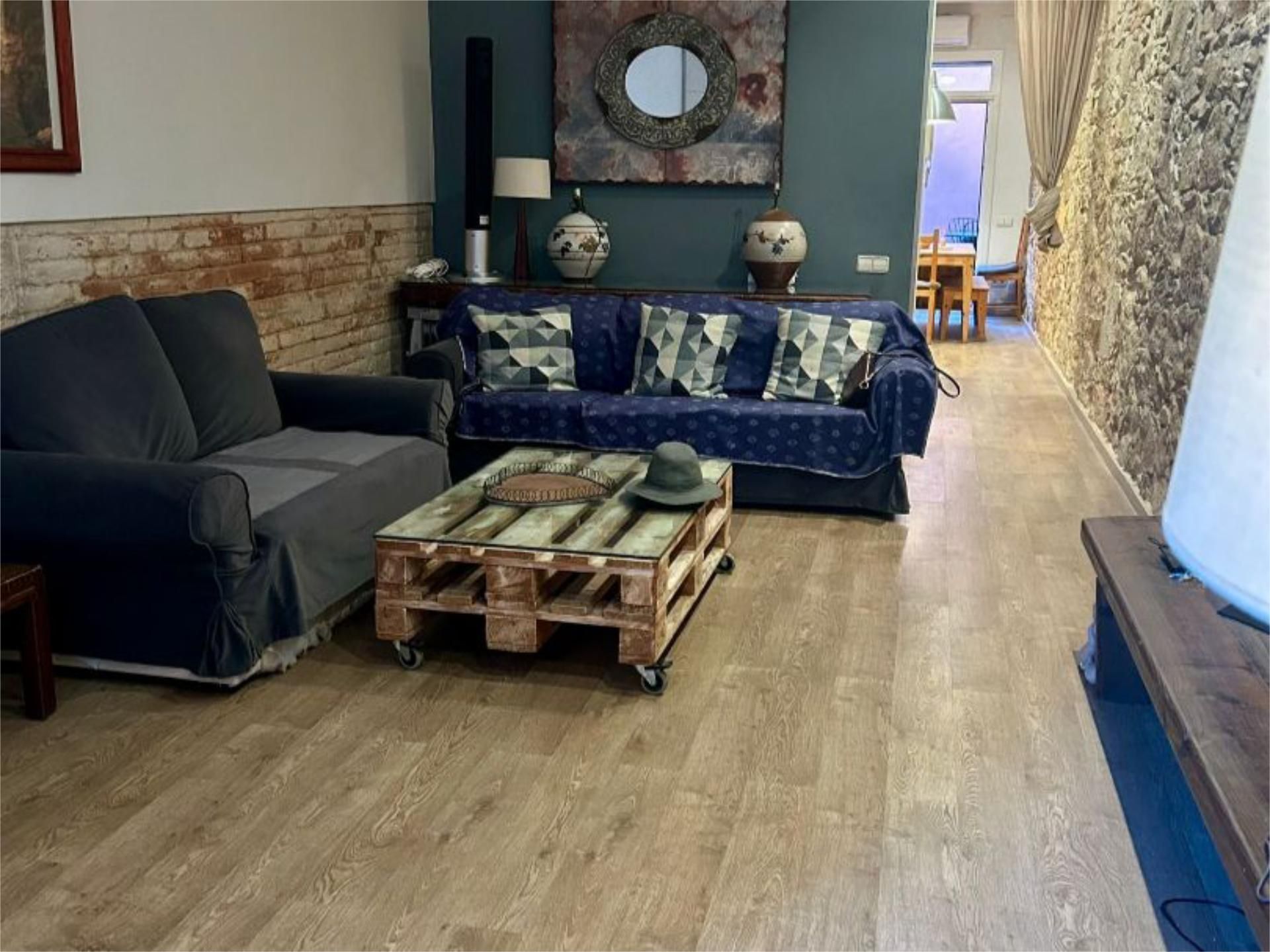 Planta baja to rent in Carrer de Gavà, 65, La Bordeta Living room of Planta baja to rent in Barcelona Capital with Air Conditioner, Heating and Private garden