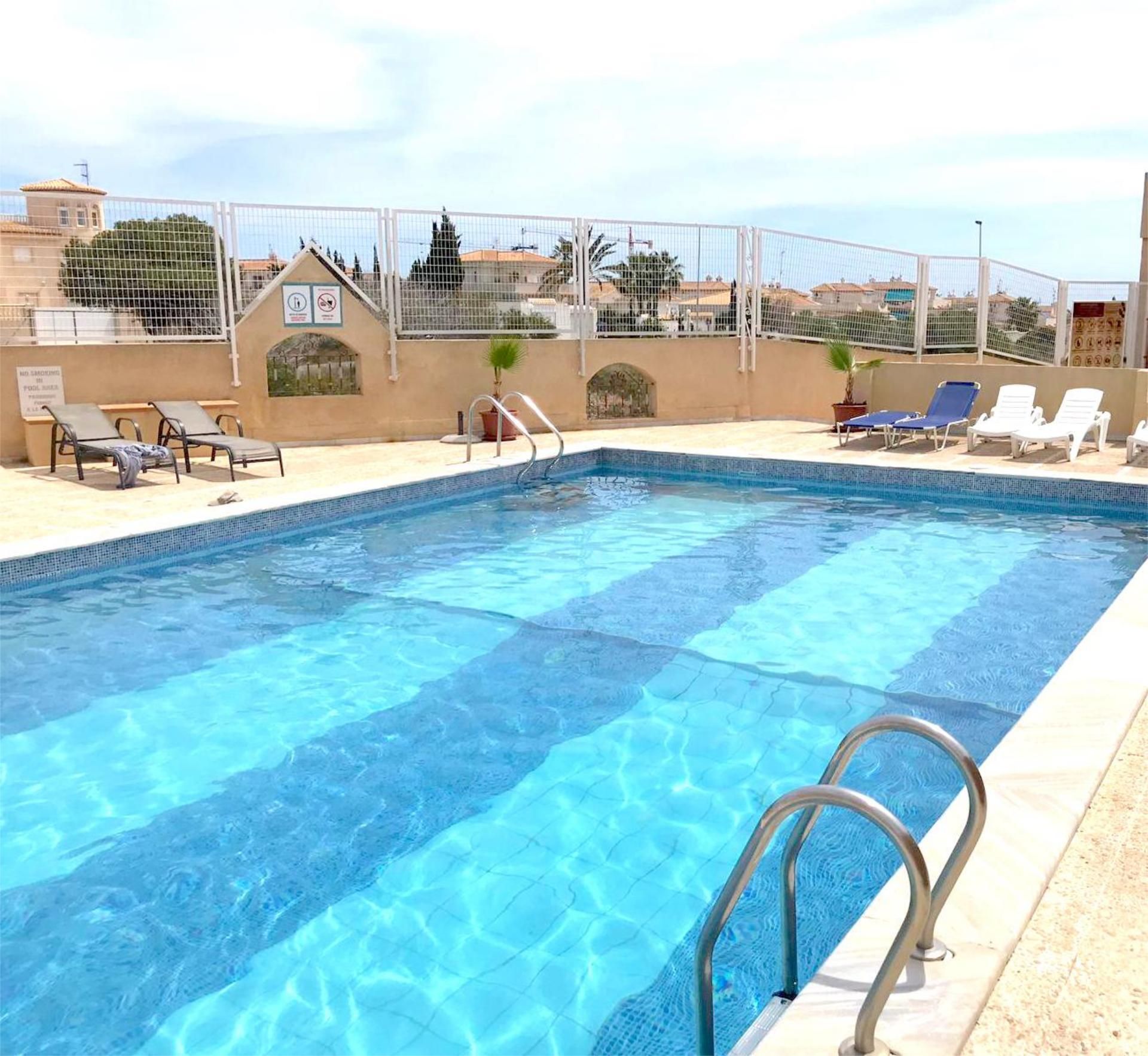 Single-family semi-detached for sale in Calle 3, 38, Playa Flamenca Swimming pool of Single-family semi-detached for sale in Orihuela with Air Conditioner, Terrace and Swimming Pool