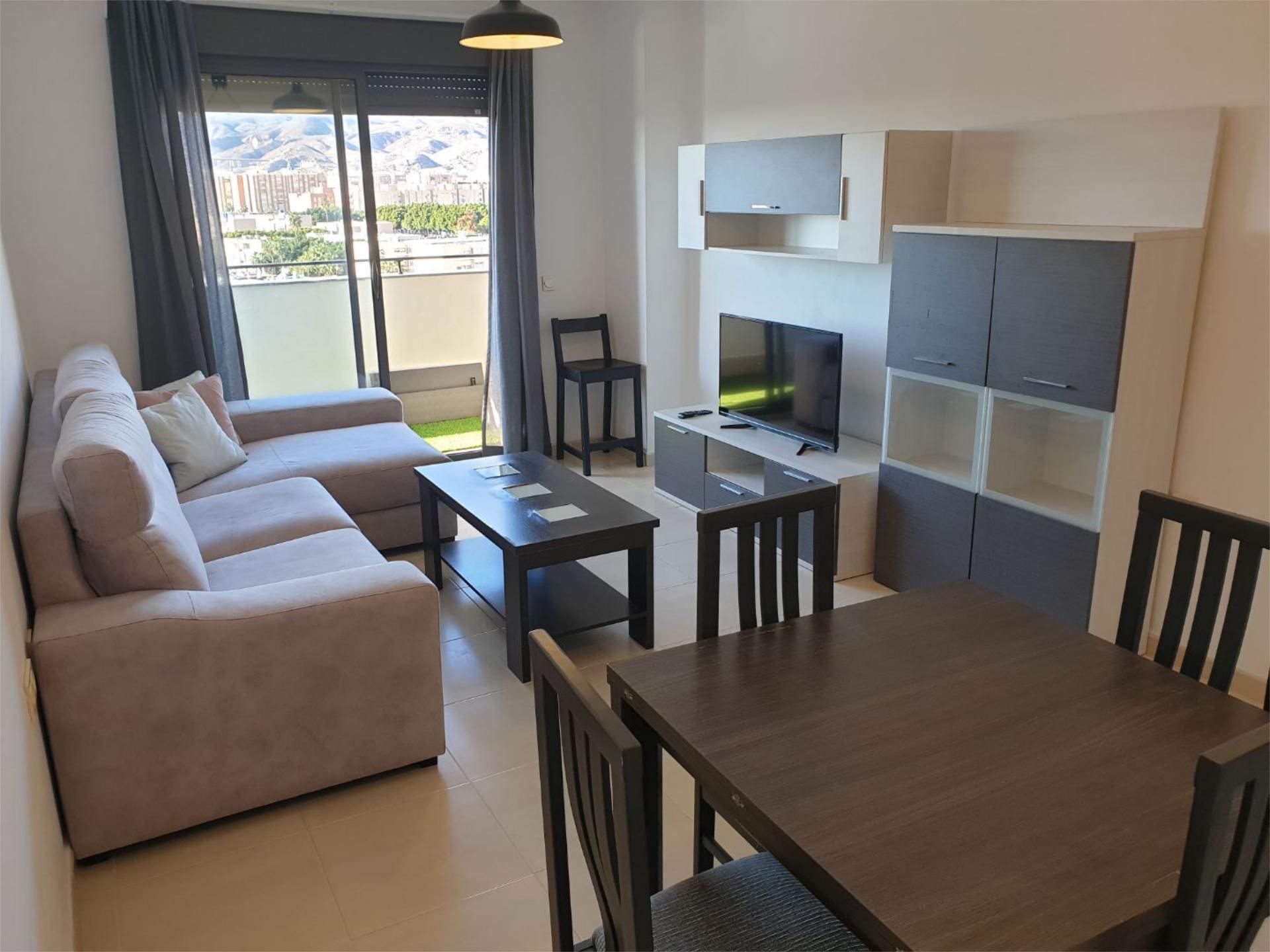 Pis de lloguer a Calle Ravel, 4, Nueva Almería - Cortijo Grande - Vega de Acá Sala d'estar de Pis de lloguer en Almería Capital amb Aire condicionat, Calefacció i Terrassa