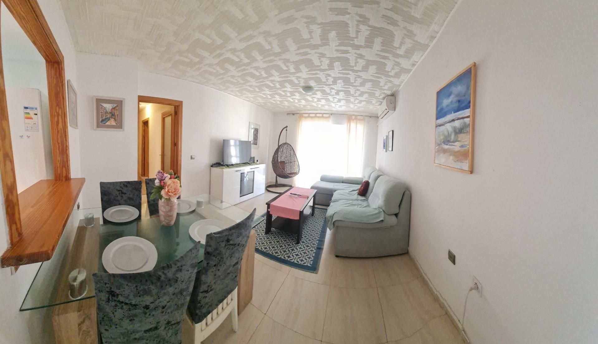 Pis en venda a Carretera de Alicun, 319, El Parador de las Hortichuelas Sala d'estar de Pis en venda en Roquetas de Mar amb Aire condicionat, Calefacció i Moblat