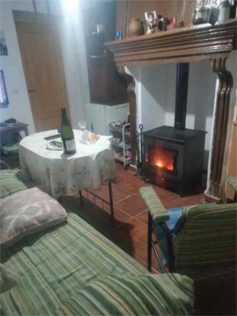 Sala d'estar de Casa o xalet en venda en Torrubia del Castillo amb Moblat